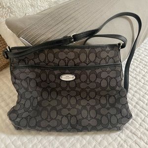 Coach Purse, black, with long adjustable strap. Medium to large size bag.